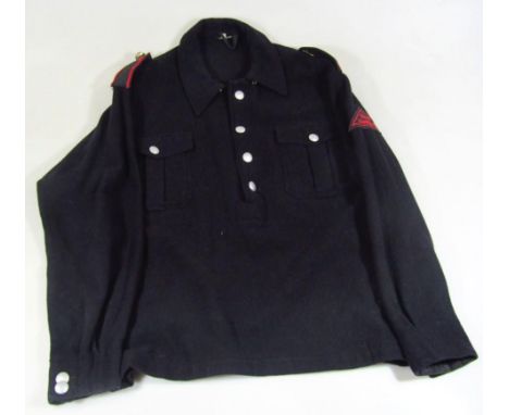 A replica Hitler Youth woolen tunic, having two breast pockets, half button front, printed epaulets and Nord Hamburg triangul
