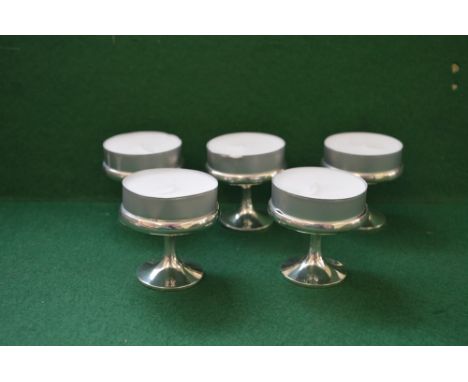 Set of five Sterling silver tea light holders on pedestal foot