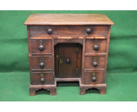 Georgian mahogany writing desk the top having moulded edge over single long drawer above a single central short drawer and cu