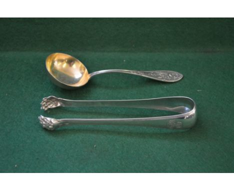 Quantity of French silver items to comprise: Elegant design cream ladle with gilded bowl and a pair of claw end sugar tongs, 