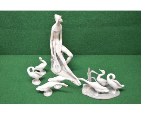 Group of five Lladro figures of geese together with a large Nao figure of a female luteist