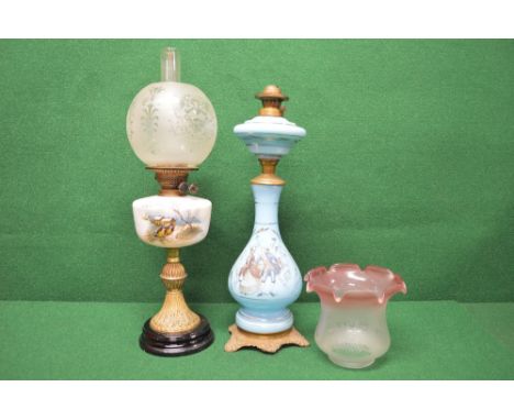 Blue glass oil lamp having transfer decoration of figures, standing on a metal base - 23.75" tall  (no chimney or shade) toge