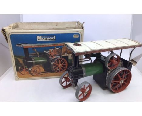 Mamod: A Mamod T.E.1a steam tractor, used in original box, along with another without canopy; as well as an unboxed Mamod Ste