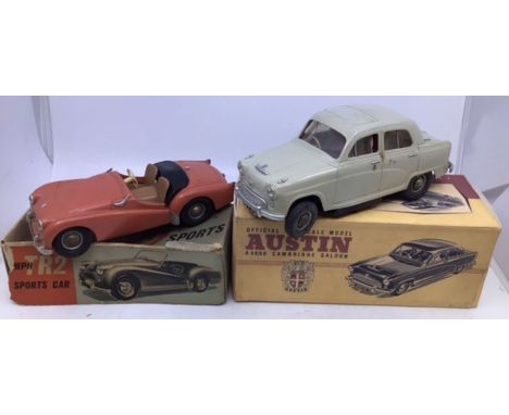 Victory Industries battery operated 1:18 scale Austin A40 Cambridge in reproduction box and Triumph TR 2 in damaged part box.