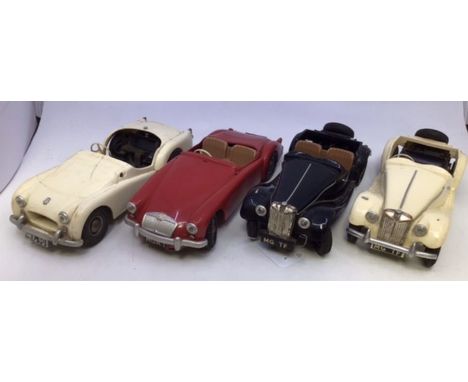 Victory: A collection of four unboxed Victory Industries, battery operated vehicles to comprise: MGA, red body with beige int