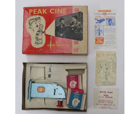 J.S. Frieze: A boxed Peak Cine 8mm Junior Projector, featuring Laurel and Hardy, in original box, with instructions.