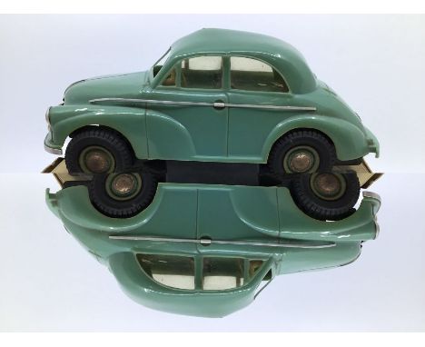 Victory: A boxed Victory Industries, Surrey, battery operated, 1:18 Scale, Morris Minor Saloon, blue/green body with beige in