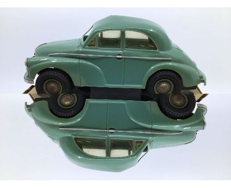 Victory: A boxed Victory Industries, Surrey, battery operated, 1:18 Scale, Morris Minor Saloon, blue/green body with beige in