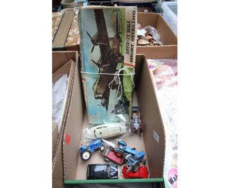Unmade Airfix kit of a Short Sterling, Diecast dinky tractors and trailors, 2 Diecast cars 