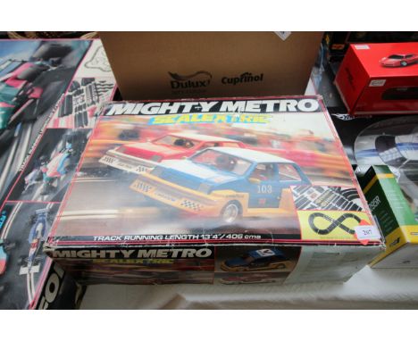 Vintage boxed Scalextric Mighty Metro Set with two vehicles 