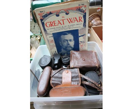 Collection of vintage cameras, Pentax SLR lenses and other items in cases, together with some Great War magazines from the Fi