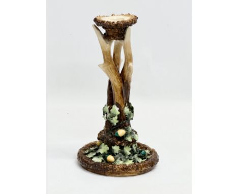 A Late 19th Century Majolica antler and acorn candlestick. 13x24cm.