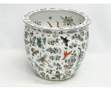 A large 20th Century Taiwan Porcelain Ware Famille Rose fish bowl/planter. 40x36cm