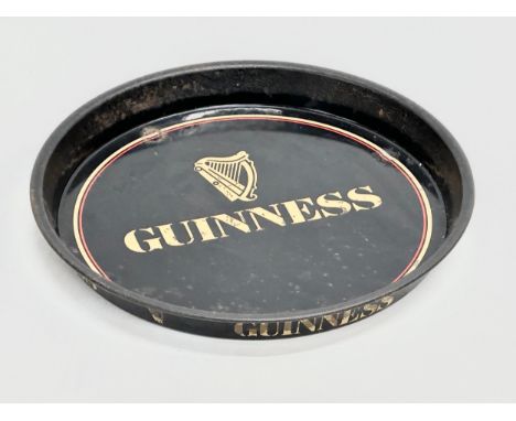 A vintage Guinness pub tray. 31cm