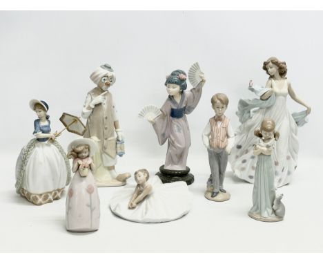 A collection of Lladro and NAO figurines. 32cm. 30cm. 29cm. 24cm. 23cm