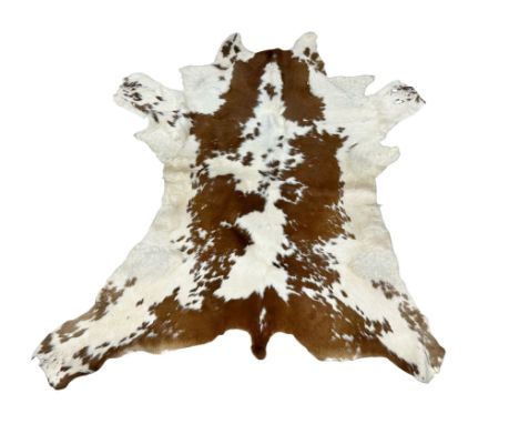 A vintage goats hide throw. 94x105cm