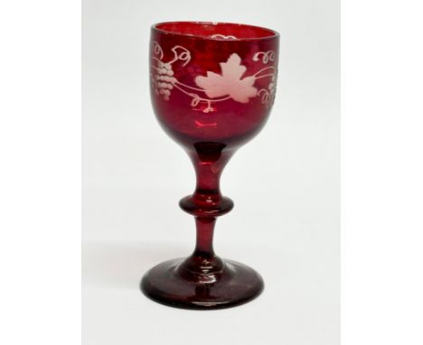 An Early 19th Century Bohemian etched ruby port glass. Circa 1800-1810. 10cm