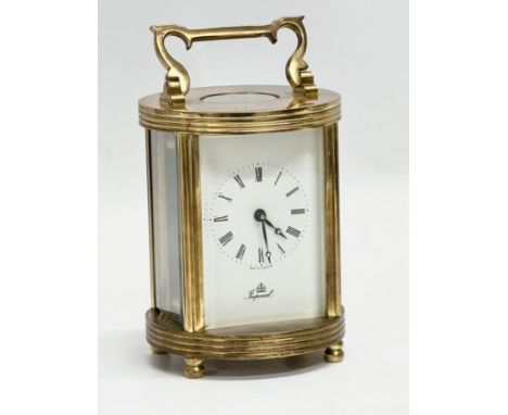 An Imperial brass cased carriage clock with Fema movement. With key.