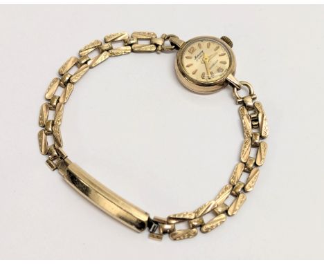 A vintage rolled gold ladies watch.