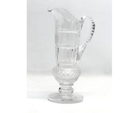 A tall Late 19th Century etched glass pitcher. 30cm
