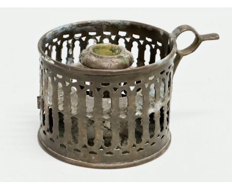 An Early 20th Century pierced brass chamber stick/candleholder. 15x11x9cm