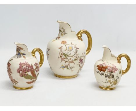 Three Late 19th Century Royal Worcester Blush Ivory flat back jugs. 15x18cm. 11x14cm. 11x13cm