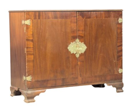 A large Early 20th Century Chippendale Revival mahogany linen cupboard. 126x49x100cm (6)