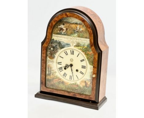 Conrad Franz. A Late 20th Century mantle clock. The Wildlife Clock. 27x11x37cm