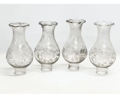 A set of 4 Early 20th Century etched glass oil lamp funnels. 24cm