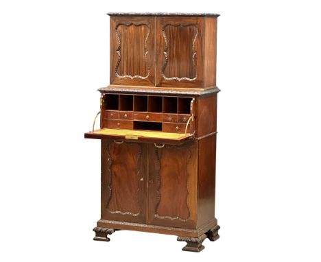 An Early 20th Century Chippendale Revival mahogany secretaire cabinet, with pigeon hole shelves and lower double door cupboar