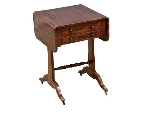 A small Early 19th Century, Regency period mahogany sofa table, with rosewood crossbanding and 2 drawers. Circa 1810. Open 93