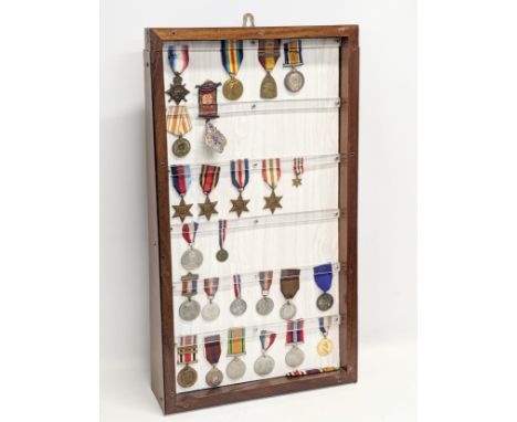 A collection of vintage military medals, including First World War George V silver medal. World War II Burma Star, The French