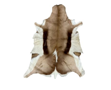 A vintage goats skin throw. 65x93cm