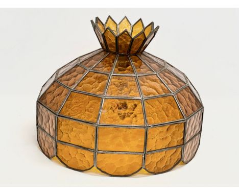A large Mid 20th Century stained glass light shade. 39x29.5cm
