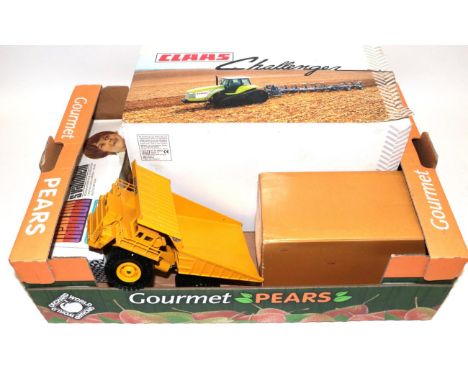 Conrad Wabco Tipper together with a Claas Challenger 1:16 scale model and a Kovodruszstvo Tractor and trailer set (all boxed)