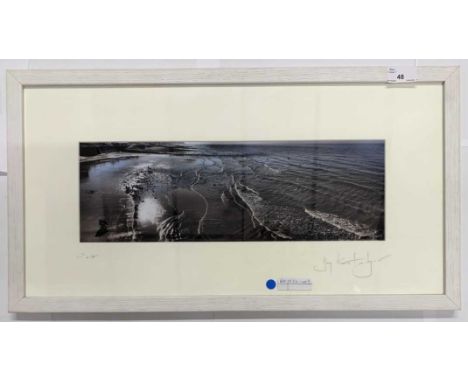 Contemporary photographic print of an unidentified coast, indistinctly signed lower right in pencil, 2017. Mounted in a woode