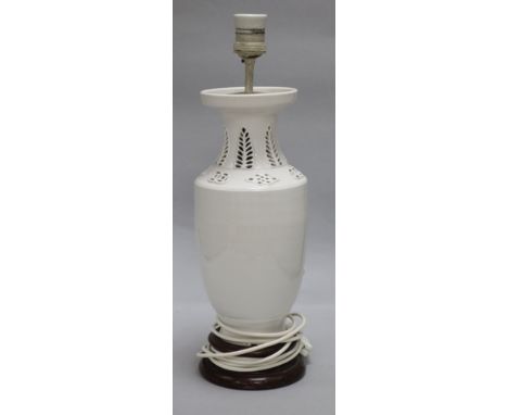 A Chinese figural whiteware lamp base