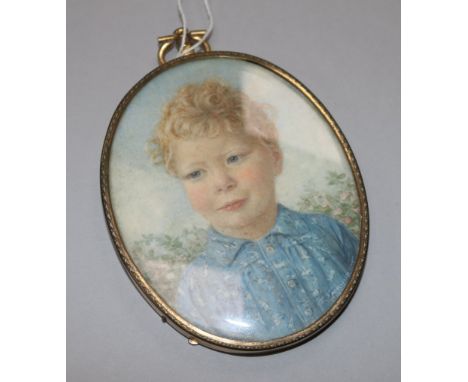 A portrait miniature of a boy and a candelabra stamped 925
