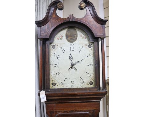 An early 19th century oak longcase clock, with painted Arabic dial,