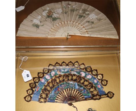 Two Chinese export fans, 19th century, the first a gilt decorated lacquer cabriolet fan, c.1860, with bird, flower and figure