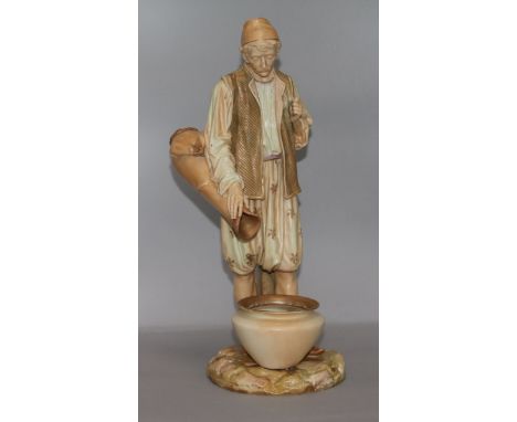 A large Royal Worcester figure of an Arab water carrier