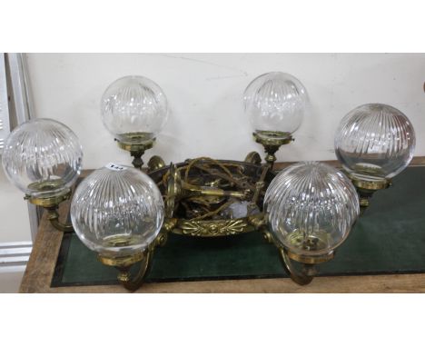 A six branch ceiling light with shades