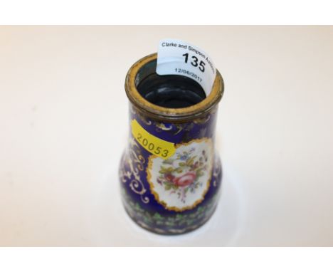 An item of floral decorated enamel ware on blue ground