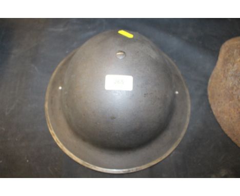 A WW2 British helmet 