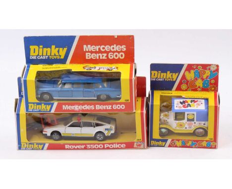 A Dinky Toys group of three to include a Dinky 120 Happy Cab, a Dinky 128 Mercedes Benz 600 in metallic blue and a Dinky 264 