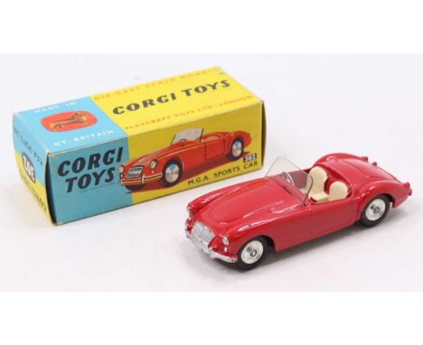 A Corgi Toys No. 302 MGA sports car comprising red body with cream interior and spun hubs, housed in the original blue &amp; 