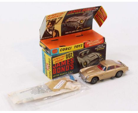 A Corgi Toys No. 261 James Bond Aston Martin DB5, of usual specification with two bandit figures, secret instruction envelope