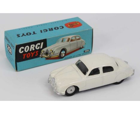 Corgi Toys, 208 Jaguar 2.4 litre, white body with silver detailing, flat spun hubs with glazing, in the original all-card blu