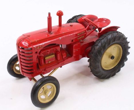 A Moko No. 745D Massey Harris tractor, larger scale example, comprising red body with tan wheels, and gold lettering, model a