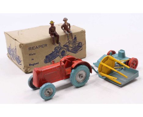 A boxed Charbens Farm series Farm Reaper, comprising orange tractor, with silver hubs and blue tyres, complete with blue and 